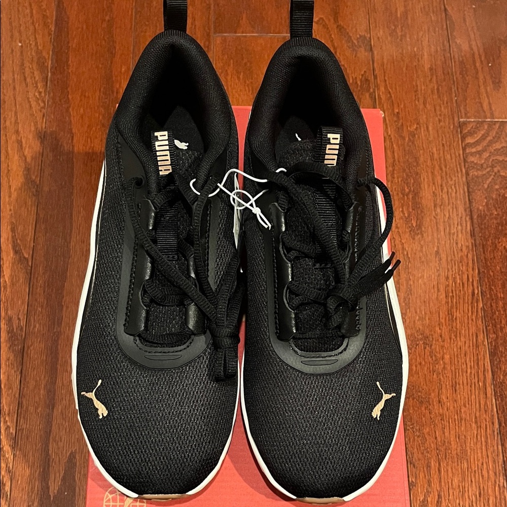 Puma Black and Gold Athletic Shoes